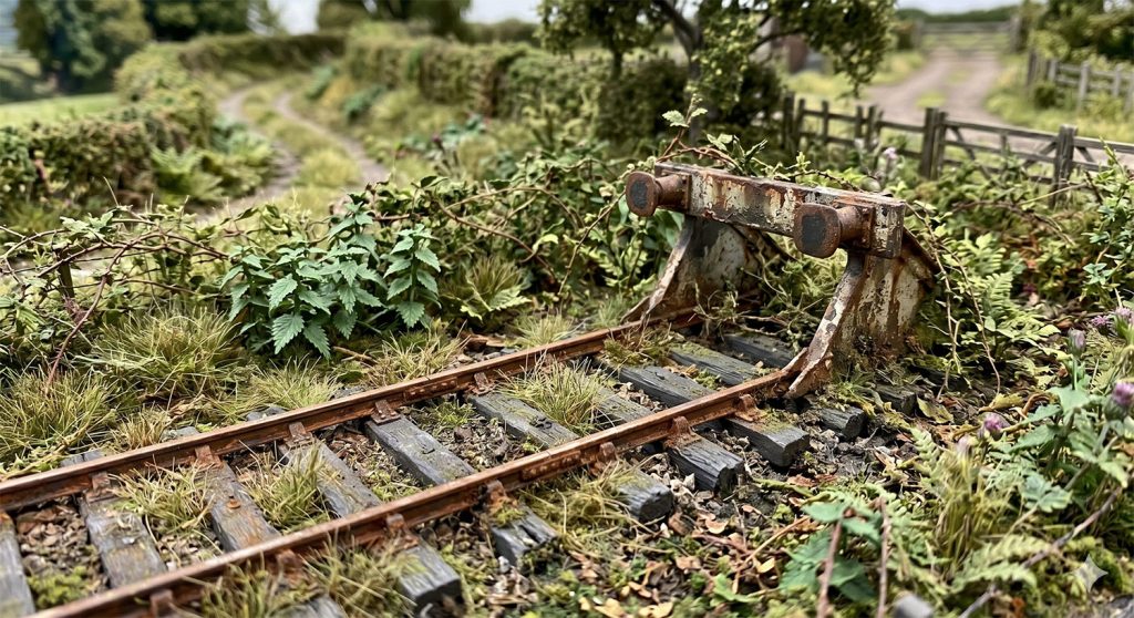 A derelict siding on a model railway layout makes a great focal point.