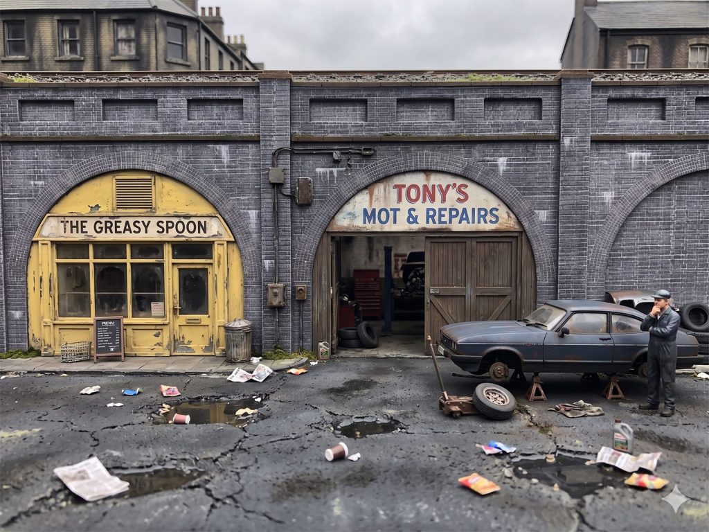 A greasy spoon cafe and backstreet garage in the railway arches make a great scene.